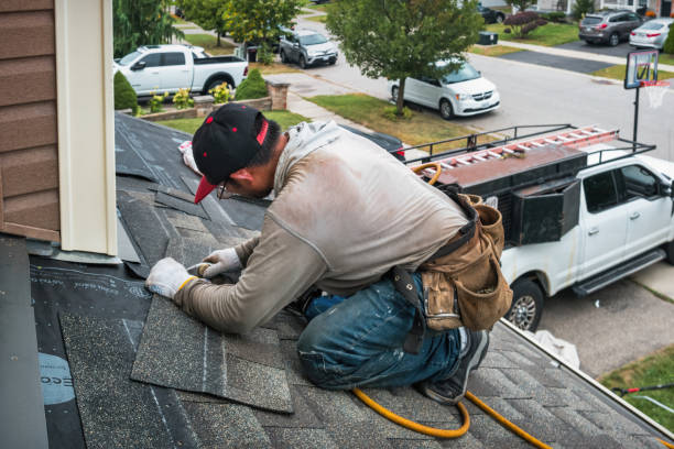 Professional Roofing technician working in Centuria, WI